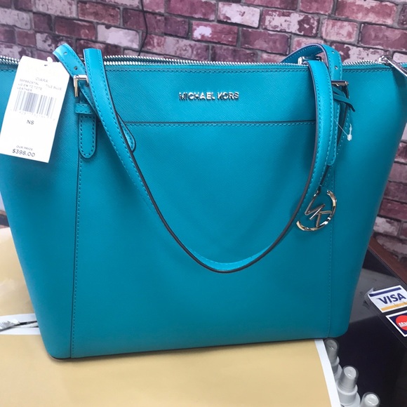 Ciara large signature ew top zip tote bag in blue
